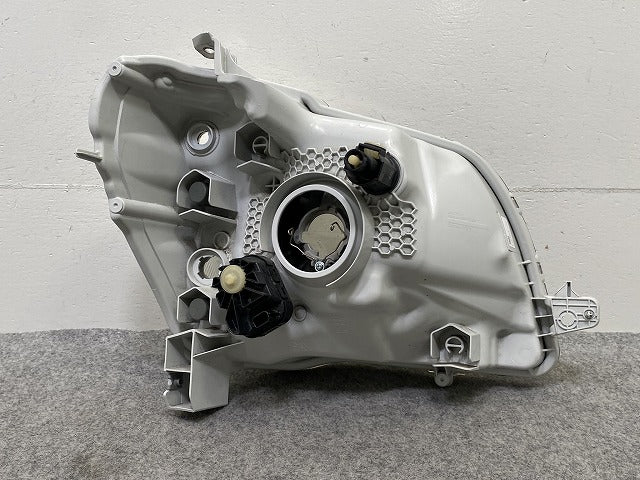 タント LA600S/LA610S 純正 左 ヘッドライト/ランプ ハロゲン レベライザー ICHIKOH 1880 81170-B2540 ダイハツ(147976)