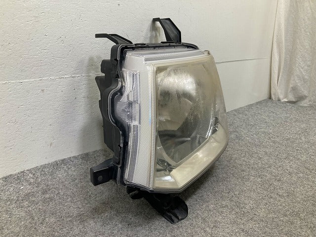 eKワゴン H82W 純正 左 ヘッドライト/ランプ レベライザーハロゲン STANLEY P6519 三菱(148125)