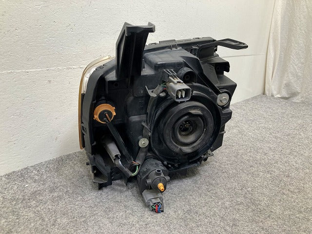 eKワゴン H82W 純正 左 ヘッドライト/ランプ レベライザーハロゲン STANLEY P6519 三菱(148125)