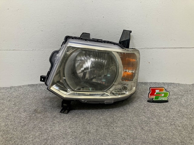 eKワゴン H82W 純正 左 ヘッドライト/ランプ レベライザーハロゲン STANLEY P6519 三菱(148129)