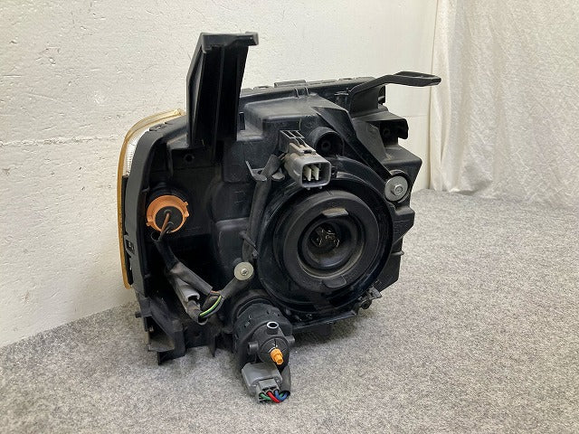 eKワゴン H82W 純正 左 ヘッドライト/ランプ レベライザーハロゲン STANLEY P6519 三菱(148129)