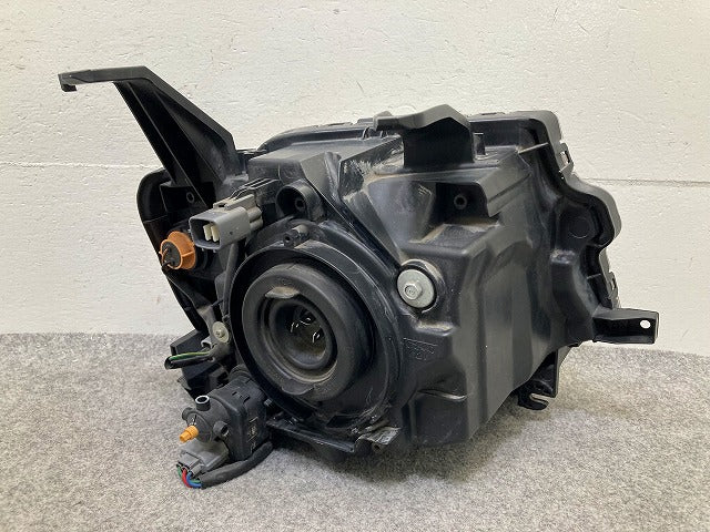 eKワゴン H82W 純正 左 ヘッドライト/ランプ レベライザーハロゲン STANLEY P6519 三菱(148129)
