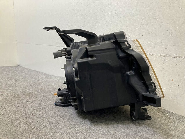 eKワゴン H82W 純正 左 ヘッドライト/ランプ レベライザーハロゲン STANLEY P6519 三菱(148129)