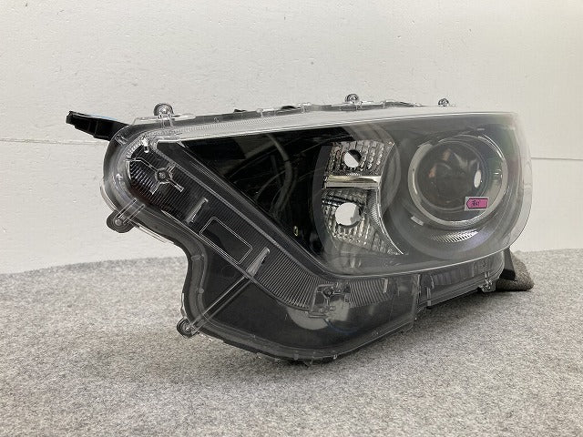 ヤリス KSP210/MXPA10/MXPA15/MXPH10/MXPH15 MXPH14/MXPH17 純正 左 ヘッドライト/ランプ レベライザーハロゲン 刻印A5 K0-1(148469)