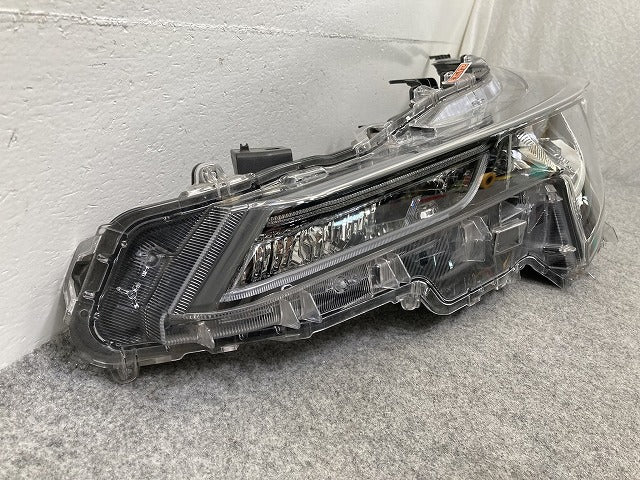 カローラ ツーリング 210系/NRE210W/ZRE212W/MZEA17/12/ZWE214/211/219/215 純正 左 ヘッドライト LED レベライザー 刻印U 12-633(148546)