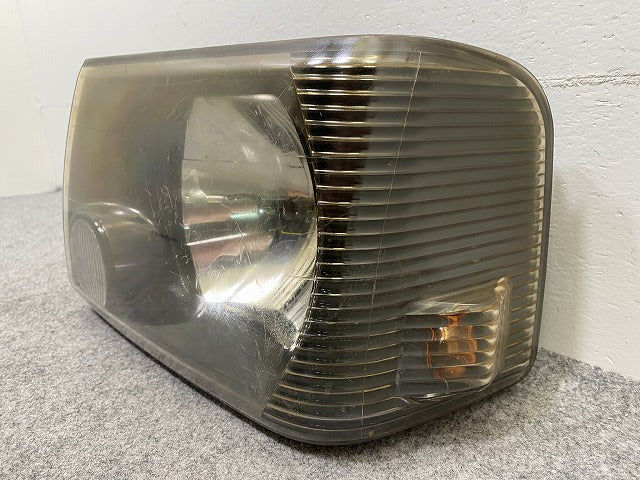 ミニキャブ U61V/U62V/U62T/U61W/U62W/U71 純正 左 ヘッドライト/ランプ ハロゲン 刻印0 STANLEY P1711 三菱(148607)
