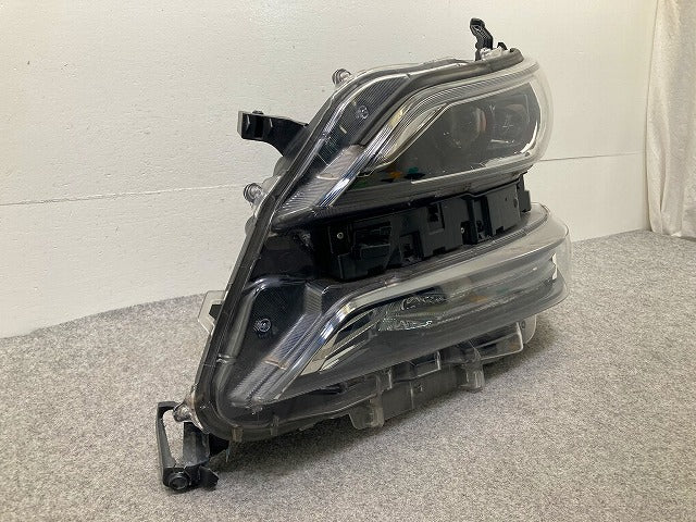 ジャンク!ヴェルファイア AGH30W/AGH35W/GGH30W/GGH35W 純正 前期 左 ヘッドライト/ランプ LED 刻印キ ICHIKOH 58-64 81145-58391(148715)