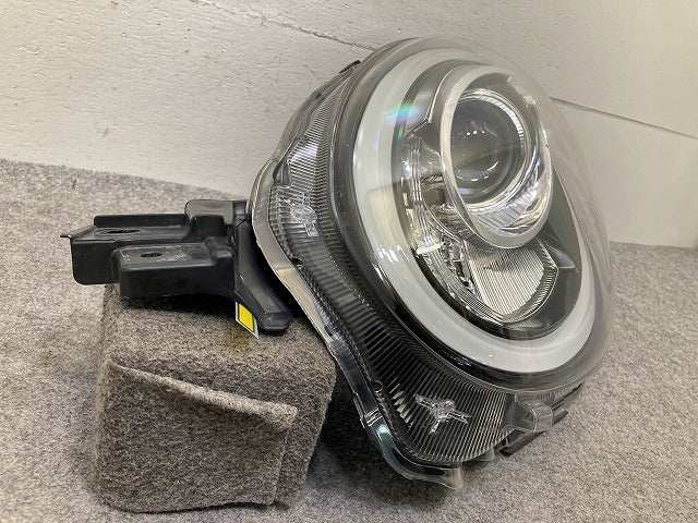 パッソ モーダ M700A/M710A 純正 左 ヘッドライト/ランプ LED レベライザー KOITO 100-69028 トヨタ(148827)