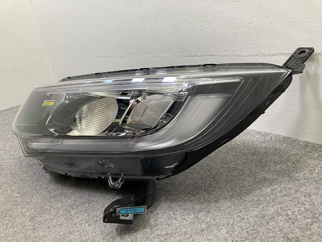 フリード GB5/GB6 純正 前期 左 ヘッドライト/ランプ レベライザーハロゲン STANLEY W2171 33150-TDK-J02 ホンダ(149316)