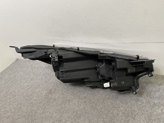 ヤリス KSP210/MXPA10/MXPA15/MXPH10/MXPH15 純正 左 ヘッドライト/ランプ レベライザー ハロゲン 刻印A5 KOITO K0-1 81170-K0010(149656)