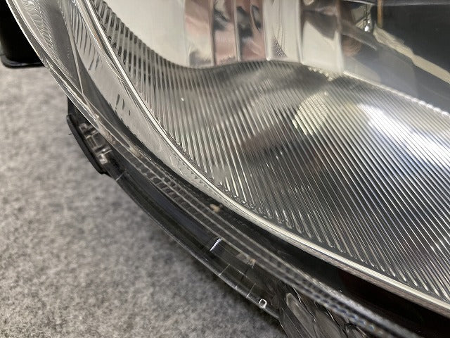 ヴィッツ 90系/NCP91/NCP95/KSP90/SCP90 純正 後期 右 ヘッドライト/ランプ キセノン HID レベライザー 刻印A0 ICHIKOH 52-183(149683)