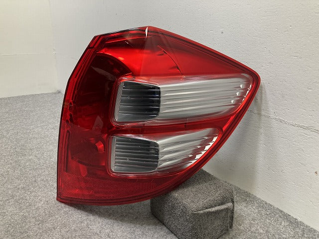 フィット GE6/GE7/GE8/GE9 純正 右 テールランプ/ライト/レンズ ハロゲン RH STANLEY P7030 ホンダ(149867)
