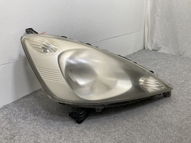 フィット GE6/GE7/GE8/GE9 純正 前期 右 ヘッドライト/ランプ ハロゲン レベライザー RH STANLEY P6865 ホンダ(149906)
