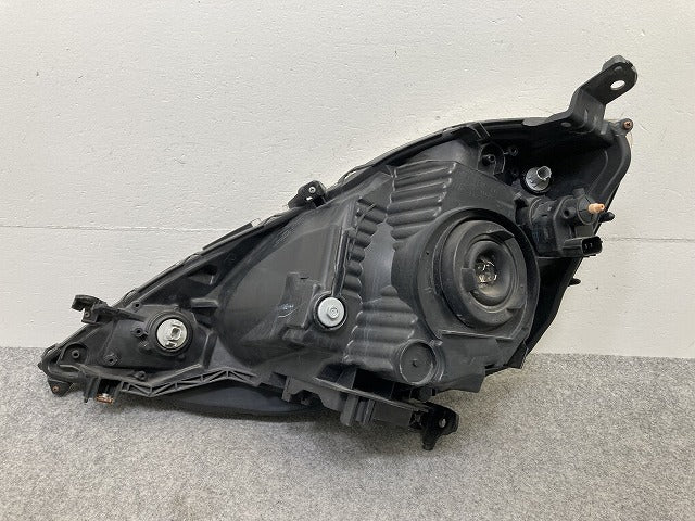 フィット GE6/GE7/GE8/GE9 純正 前期 右 ヘッドライト/ランプ ハロゲン レベライザー RH STANLEY P6865 ホンダ(149906)