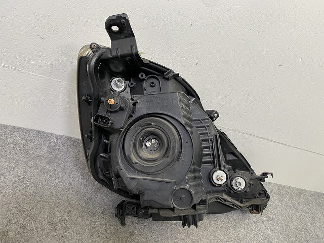 フィット GE6/GE7/GE8/GE9 純正 前期 左 ヘッドライト/ランプ ハロゲン レベライザー LH STANLEY P6865 ホンダ(149911)