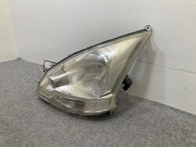 ムーヴ LA100S/LA110S 純正 前期 左 ヘッドライト/ランプ ハロゲン レベライザー LH STANLEY P9501 ダイハツ(150638)