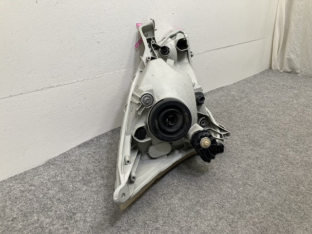 ムーヴ LA100S/LA110S 純正 前期 左 ヘッドライト/ランプ ハロゲン レベライザー LH STANLEY P9501 ダイハツ(150638)