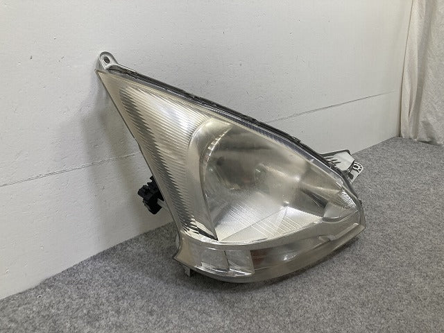 ムーヴ LA100S/LA110S 純正 前期 右 ヘッドライト/ランプ ハロゲン レベライザー 刻印ラ RH STANLEY P9501 ダイハツ(150639)