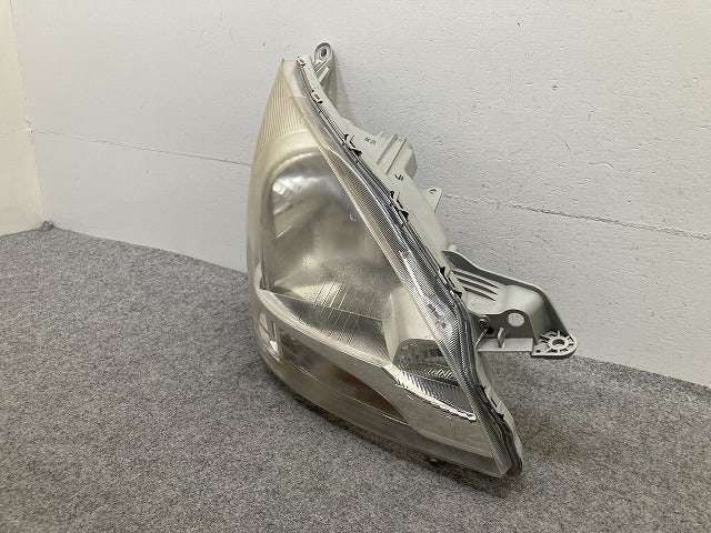 ムーヴ LA100S/LA110S 純正 前期 右 ヘッドライト/ランプ ハロゲン レベライザー 刻印ラ RH STANLEY P9501 ダイハツ(150639)