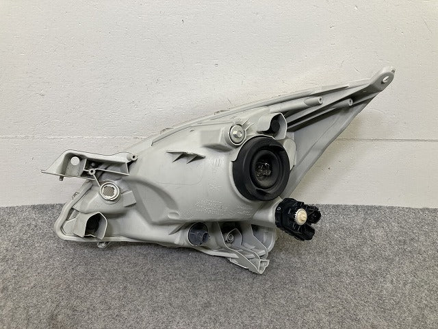 ムーヴ LA100S/LA110S 純正 前期 右 ヘッドライト/ランプ ハロゲン レベライザー 刻印ラ RH STANLEY P9501 ダイハツ(150639)
