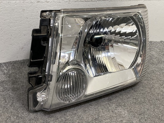 ミニキャブ/クリッパー U61T/U62T/U61V/U62V/U71V/U72V 純正 左 ヘッドライト/ランプ ハロゲン LH STANLEY P5701 三菱(151228)