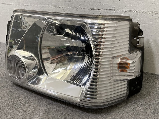 ミニキャブ/クリッパー U61T/U62T/U61V/U62V/U71V/U72V 純正 左 ヘッドライト/ランプ ハロゲン LH STANLEY P5701 三菱(151228)