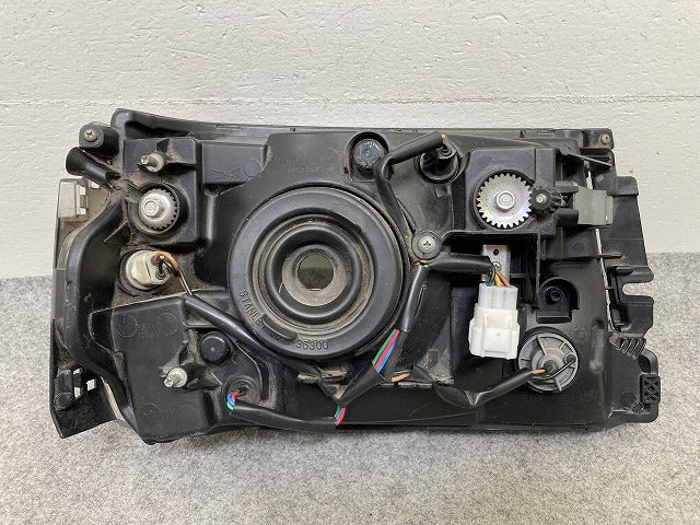 ミニキャブ/クリッパー U61T/U62T/U61V/U62V/U71V/U72V 純正 左 ヘッドライト/ランプ ハロゲン LH STANLEY P5701 三菱(151228)
