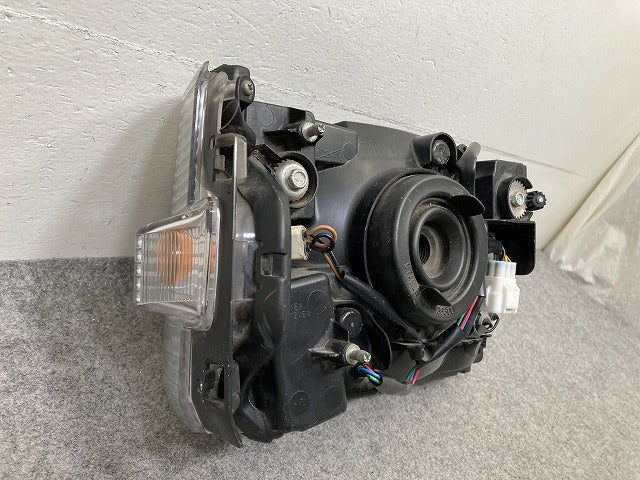 ミニキャブ/クリッパー U61T/U62T/U61V/U62V/U71V/U72V 純正 左 ヘッドライト/ランプ ハロゲン LH STANLEY P5701 三菱(151228)