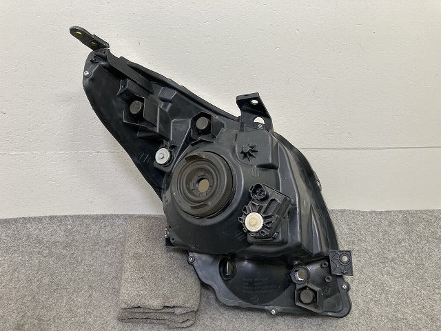 ワゴンR/AZワゴン MH23S/MJ23S 純正 前期 左 ヘッドライト/ランプ ハロゲン レベライザー LH KOITO 100-59192 スズキ(151416)