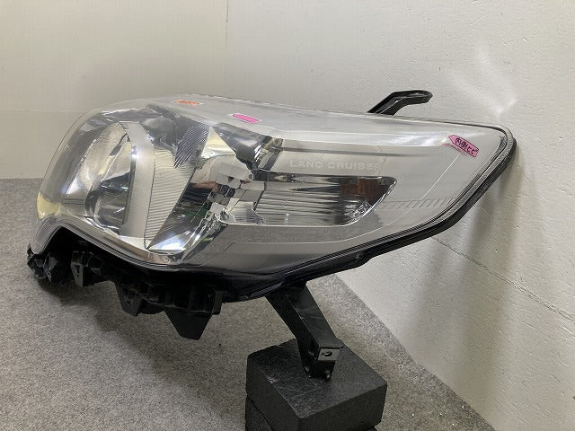 ランドクルーザー/ランクル 150系 TRJ150W 純正 中期 左 ヘッドライト/ランプ レベライザーハロゲン 刻印P LH KOITO 60-201 トヨタ(151506)