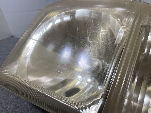 バモス HM1/HM2 純正 左 ヘッドライト/ランプ ハロゲン レベライザー KOITO 100-22630 ホンダ(152330)