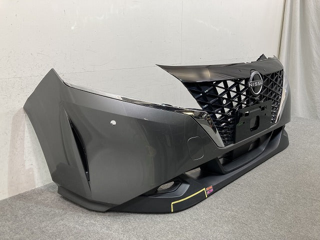 ノート/NOTE E13/SNE13 純正 前期 フロント バンパー スポイラー グリル付 62022 6XJ0H ダークメタルグレーメタリック KAD 日産(152389)