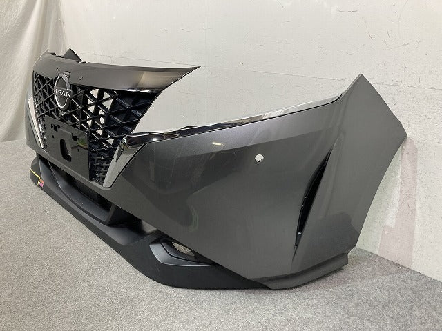 ノート/NOTE E13/SNE13 純正 前期 フロント バンパー スポイラー グリル付 62022 6XJ0H ダークメタルグレーメタリック KAD 日産(152389)