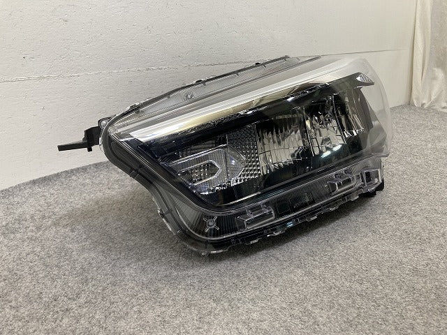 ライズ A200A/A210A/A201A/A202A 純正 左 ヘッドライト/ランプ LED レベライザー LH ICHIKOH 1990 トヨタ(152528)