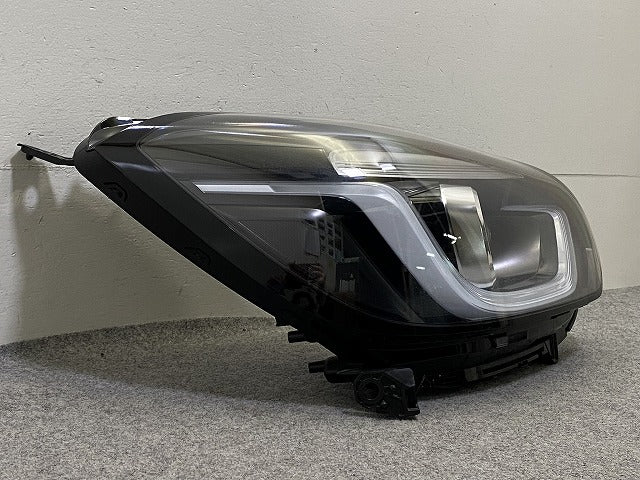 フィット GR1/GR2/GR3/GR4 純正 右 ヘッドライト/ランプ LED レベライザー STANLEY W4395 33100-TZA-J23 ホンダ(152733)