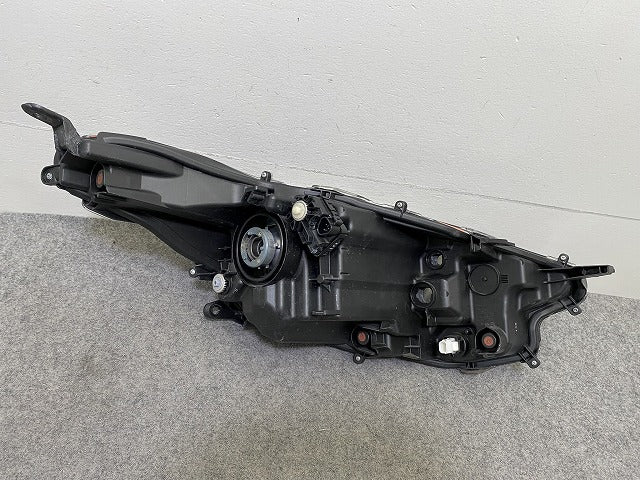 ヤリス KSP210/MXPA10/MXPA15/MXPH10/MXPH15 純正 左 ヘッドライト/ランプ ハロゲン レベライザー 刻印A5 KOITO K0-1 81170-K0010(152746)